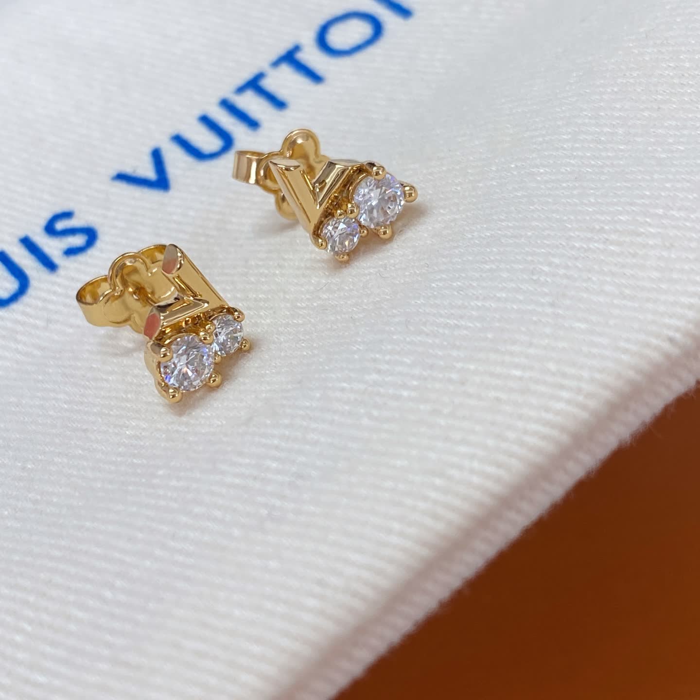 Louis Vuitton Gold Tone Stud Earrings with Clear Stones